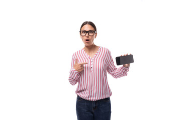 young positive slim business lady in glasses and a striped blouse wears glasses on a white background with copy space