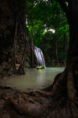 The green area looks comfortable and refreshing at Erawan Waterfall, Kanchanaburi, Thailand.