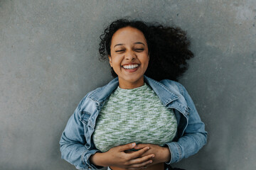 High angle view of laughing teenage girl