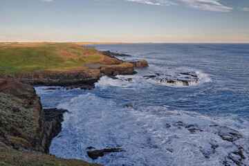 Rough surf beating the shore near Point Grant seen from the boardwalk along Phillip Island south...