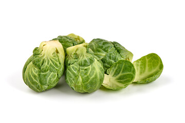 Fresh green Brussels sprouts, isolated on white background. High resolution image.