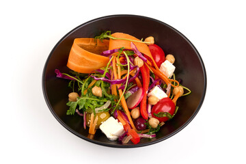 Fresh arugula salad with carrot, feta cheese, iceberg lettuce, isolated on white background.
