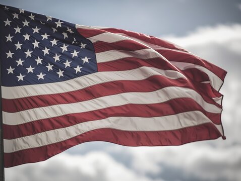 American flag fluttering against sky background