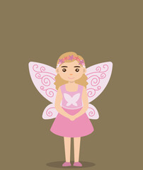 cute girl in fairy costume with wings at halloween party