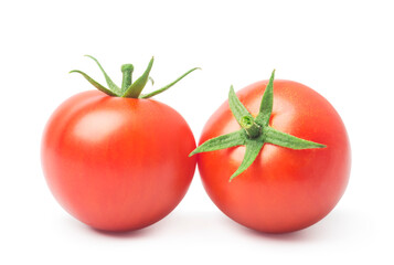 Two red tomato cherry with green leaf isolated on white background. - 653402490