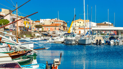 porto di stintino. view at the boats in Stintino marina in Sardinia, Italy - obrazy, fototapety, plakaty