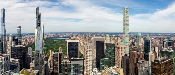 Aerial panorama view of the buildings surrounding Central Park in Midtown Manhattan