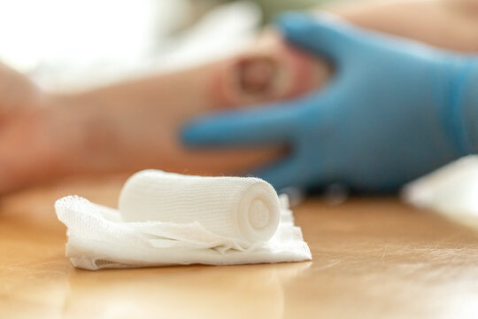 Wound care concept: Symbolizing change of dressing and cleaning and debridement of a wound with a realistic fake wound