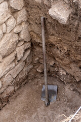 A hoe in an archaeological excavation. Work tools