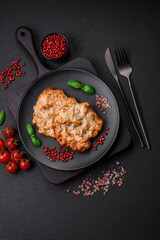 Delicious fried chicken chop or pork meat fried breaded with salt, spices and herbs