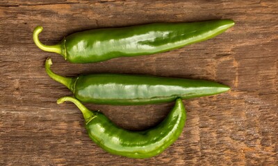 An anaheim pepper turning bright red on the plant
Green pepper on white background,Anaheim pepper Anaheim Peppers on white background