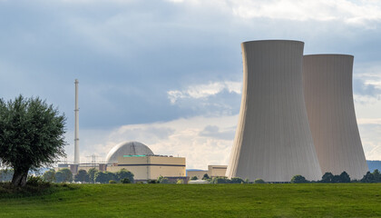Green landscape and nuclear power plant .