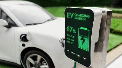 Electric car recharging with EV charger from charging station at public car park. Future innovative...