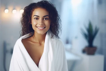 Fototapete Spa Beautiful smiling woman with the white towel on the bathroom background. Self care, spa concept