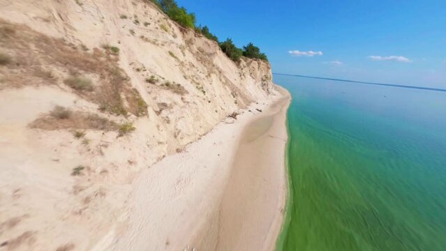 FPV, Ukraine, View from the mountain Pivikha on the Kremenchuk water reservoir near Svitlovodsk, Kirovograd region, Ukraine. Natural background in a sunny summer day.