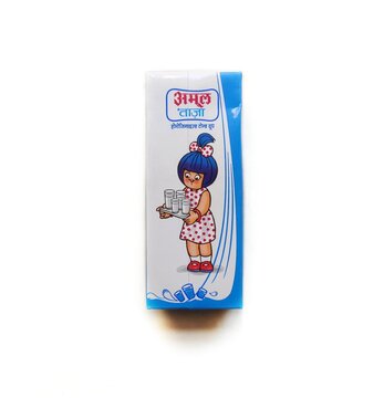 Guwahati, Assam, India - September 26, 2023 : Amul Taaza Toned Milk 200 ml (Tetra Pack). It is an excellent quality milk from Gujarat which can be consumed directly from the pack.
