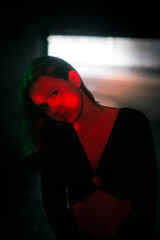 Girl in tunnel in red colours