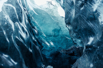 Massive ice chucks inside crevasse used for glacier hiking, vatnajokull ice mass in scandinavian...