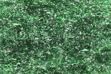 Green crystal texture. Mineral background. Closeup emerald design. Abstract pattern.