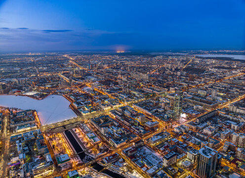 Embankment of the central pond and Plotinka in Yekaterinburg at winter sunset. The historic center of the city of Yekaterinburg, Russia, Aerial View