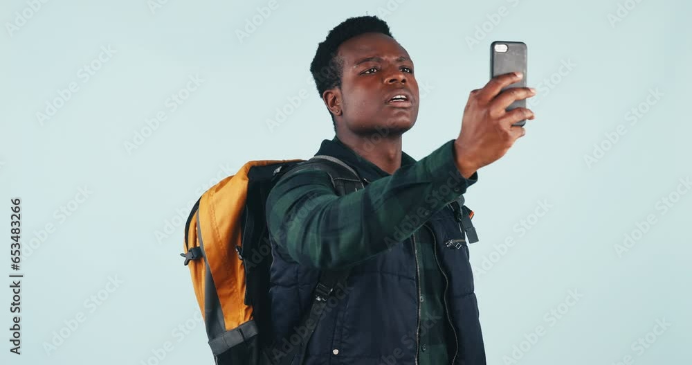 Poster phone, problem and black man hiking in studio with network, search or connection fail on grey backgr