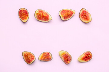 Pieces of fresh ripe figs on lilac background