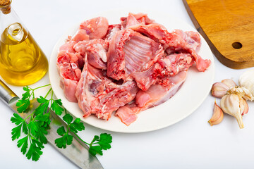 Raw rabbit meat with natural ingredients before cooking, nobody