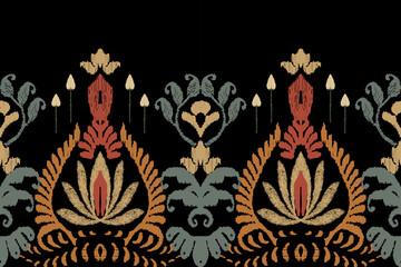 Ikat floral paisley embroidery on black background.Ikat ethnic oriental pattern traditional.Aztec style abstract vector illustration.Seamless pattern in tribal, folk embroidery, and Mexican style. 