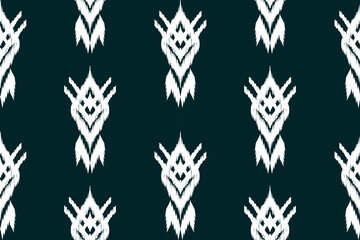 Ethnic ikat design Aztec tribal african art. Seamless pattern in tribal, folk embroidery, and Mexican style. Geometric ornament. Design for print fabric carpet, wallpaper, clothing, wrapping, fabric