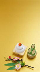 日本のお正月イメージ｜鏡餅・門松と金色の背景	