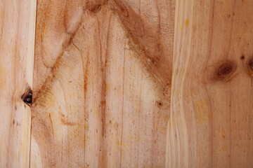 Closeup of old knotty pine board. Wood panel texture background