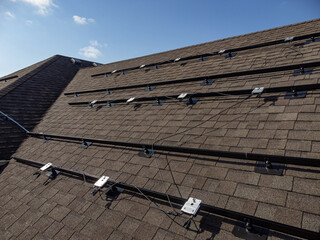 Solar electricity equipment installed on the rooftop of a house