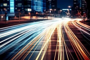 light trails on a city street with a blurred background of buildings and street lights depicts...