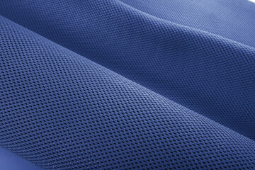 Rough navy blue fabric texture, cotton knitted fabric, modern waterproof flexible temperature control materials, multifunctional smart textile close-up, selective focus, does not tear