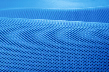 Rough blue fabric texture, cotton knitted fabric, modern waterproof flexible temperature control materials, multifunctional smart textile close-up, selective focus, does not tear