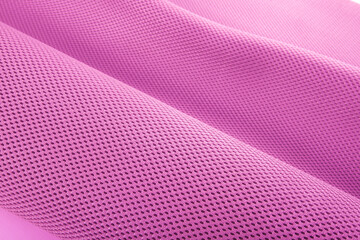 Rough pink fabric texture, cotton knitted fabric, modern waterproof flexible temperature control materials, multifunctional smart textile close-up, selective focus, does not tear.