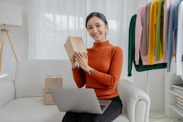 Asian women own design and tailoring shops, women's clothing business owners, sell clothes online...