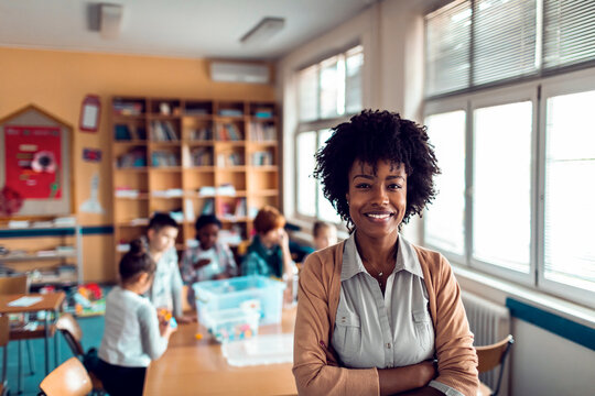 Portrait of a young African American elementary school teacher at her classroom