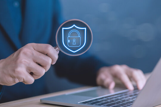 a shield lock icon is secure cyber technology in a laptop. concept of fraud, privacy data protection, and safe information business. prevent system network security in Internet digital - Powered by Adobe