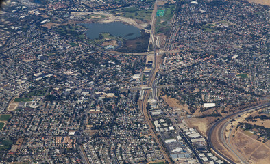 Aerial View Of Suburbs California With Lake Buildings Roads
