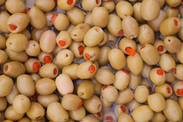slices green olives in a bowl 