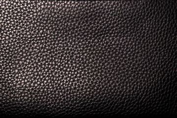 Luxury black leather background. Macro photography.