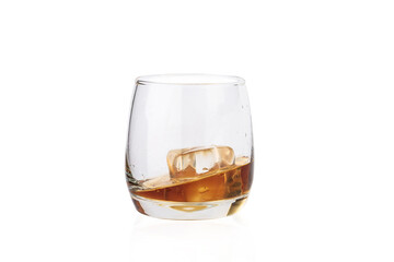 Glass of whiskey and ice isolated on white background