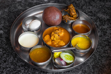 Ragi ball, Ragi mudde, Karnataka thali. Mutton and chicken curry, egg, sambar, curd