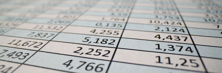 Investigation paper sheet with columns of digits in office