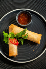 spring rolls with sauce , top view