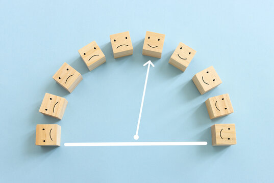 Top view image of barometer with of happy and sad face. concept of happiness emotion and satisfaction