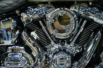 Closeup and crop engine of Chopper motorbike with chrome colors