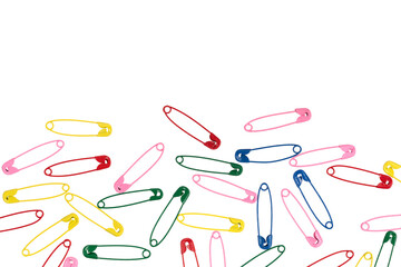 Multicolor safety pins isolated on white background. lots of colorful pins closeup