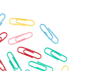 multicolored paper clips isolated on white background. close up
